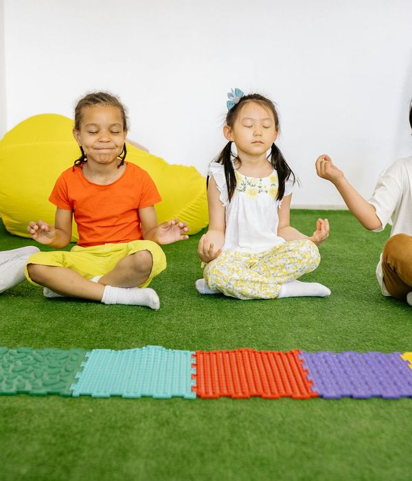 Student in a calm yoga pose finding balance.